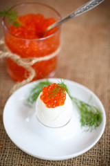 boiled egg with red caviar