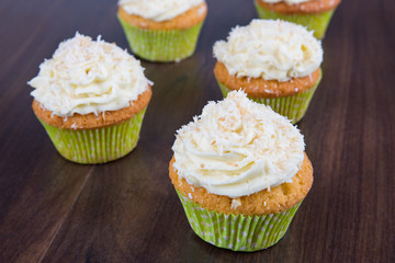 delicious homemade muffins over wooden board