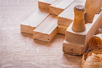 old fashioned plane with wooden planks and shawings construction
