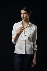 Fashion photo of young magnificent woman in white shirt