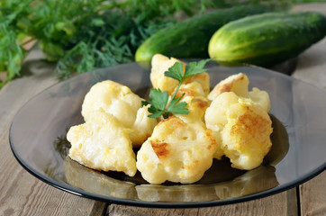 Fried cauliflower on glass plate
