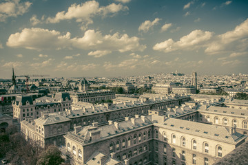 Fototapeta na wymiar Vintage tone view across rooftops in Paris France.