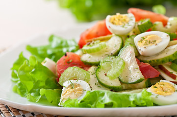 Salad of tomatoes, cucumbers and quail eggs