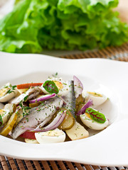 Herring salad, apples and eggs