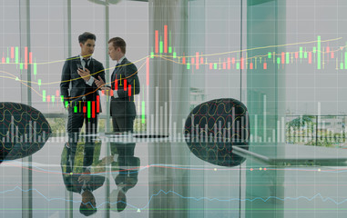 two businessman discussing with graph layer effect