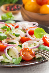 Greek salad with feta cheese, selective focus