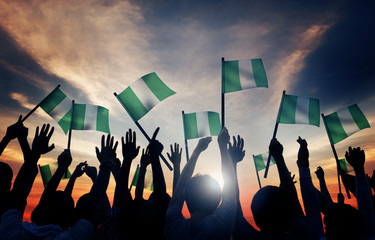 Group People Waving Flag Nigeria Back Lit Concept