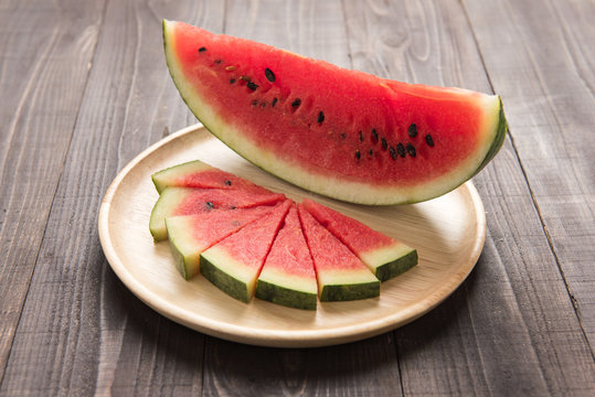 watermelon on a wood background.