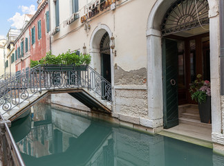 Forged metal bridge over a canal in Venice