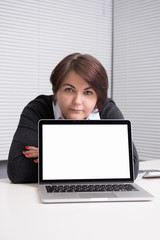 businesswoman presenting something on a laptop