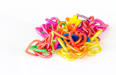 love heart made from plastic on white background