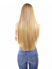 Hair. Beautiful woman with long healthy shiny smooth hair. Back