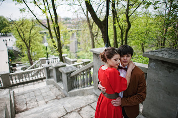 Young beautiful couple at the stairs