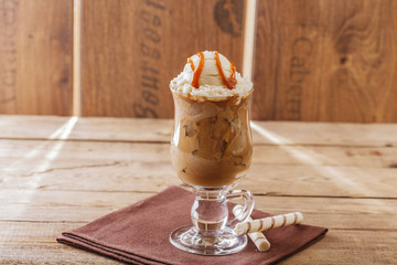 iced coffee with milk and ice cream caramel