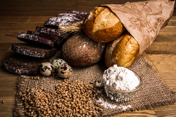 wheat bread on wooden background