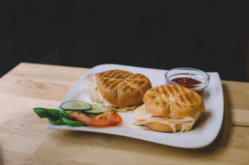 Egg and bacon muffin in retro faded style