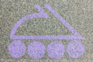 Lilac logo in the form of a roller skate on the granite floor