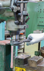 Human use wrench lock drilling tool assembly and remove