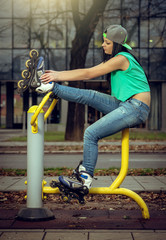 Girl relaxing on gym cycling machine