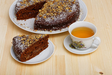 Chocolate cake and cup of tea