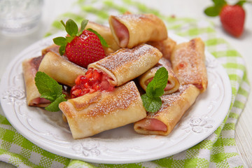 Fresh Strawberry French Crepes with Mint for Breakfast