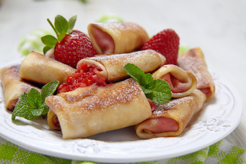 Fresh Strawberry French Crepes with Mint for Breakfast