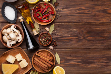 Various spices on wooden background