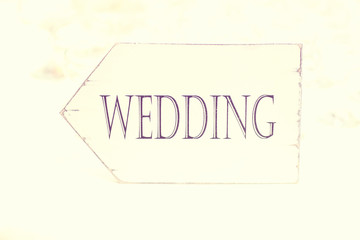 White wedding arrow sign