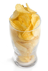 Potato chips poured into a glass