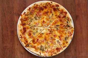 pizza on brown background