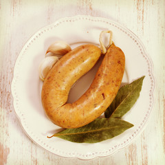 smoked portuguese sausage on white plate