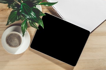 Tablet. Businessman holding a tablet with isolated screen over a