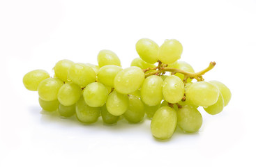 Ripe and juicy green grapes on white background