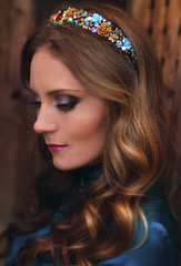 Naklejka premium Profile of the fashionable woman in a headband