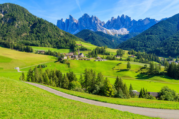 View of mountain valley and Santa Maddalena village, Dolomites