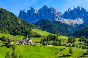 View of mountain valley and Santa Maddalena village, Dolomites