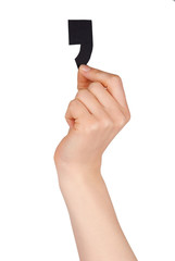 One Hand Holding Black Comma