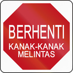 Road sign in Brunei: Berhenti - Kanak-kanak melintas/Stop - Children Crossing