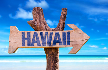 Hawaii sign with a beach background