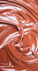 Liquid chocolate texture close up view