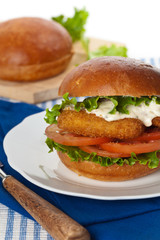 Breaded Fish burger. Selective focus.