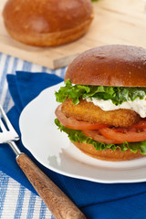 Breaded Fish burger. Selective focus.