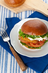Breaded Fish burger. Selective focus.