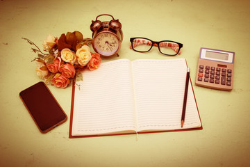  blank of book and flower with vintage filter