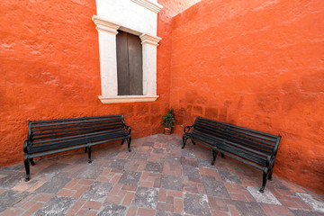 Fototapeta na wymiar Two Benches in a Monastery