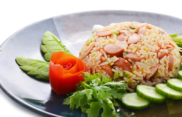 Rice with vegetables and sausages
