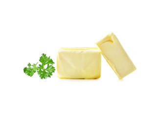 parsley and Stick of butter isolated on white.