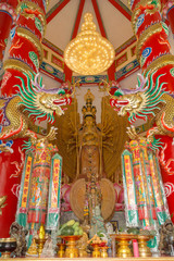 Guan Yin statue with double dragon climb the pole