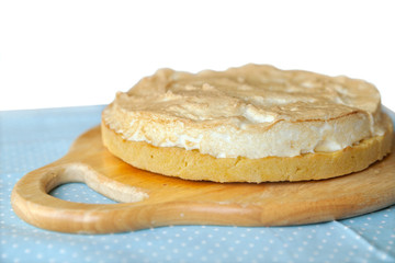 cheesecake on a wooden cutting board