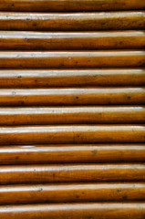 Wall of an old log house - Log house texture as a grunge background